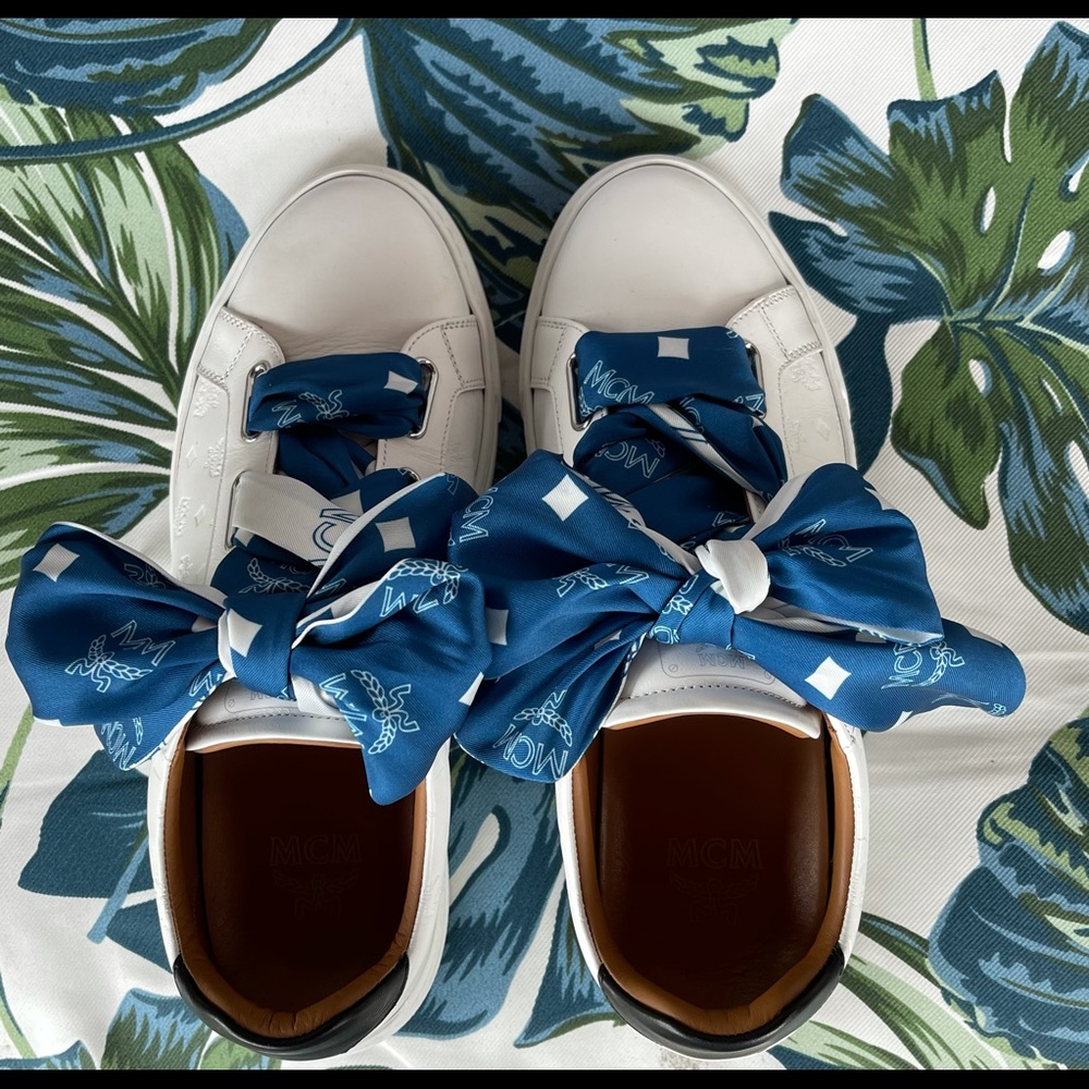 Like new worn one time women terrain sneakers in monogram calf leather.